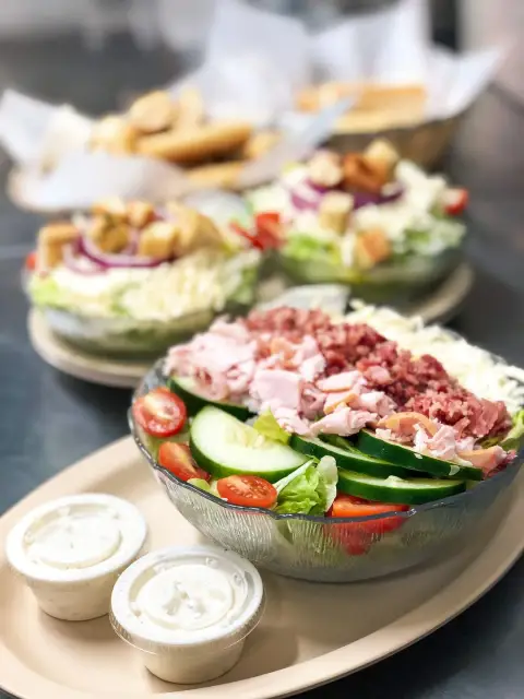 Antipasto and Greek salads