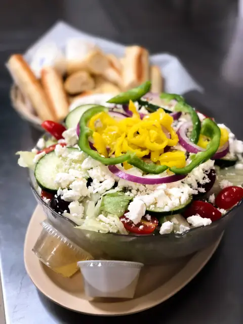 Greek salad with banana peppers, feta and beets