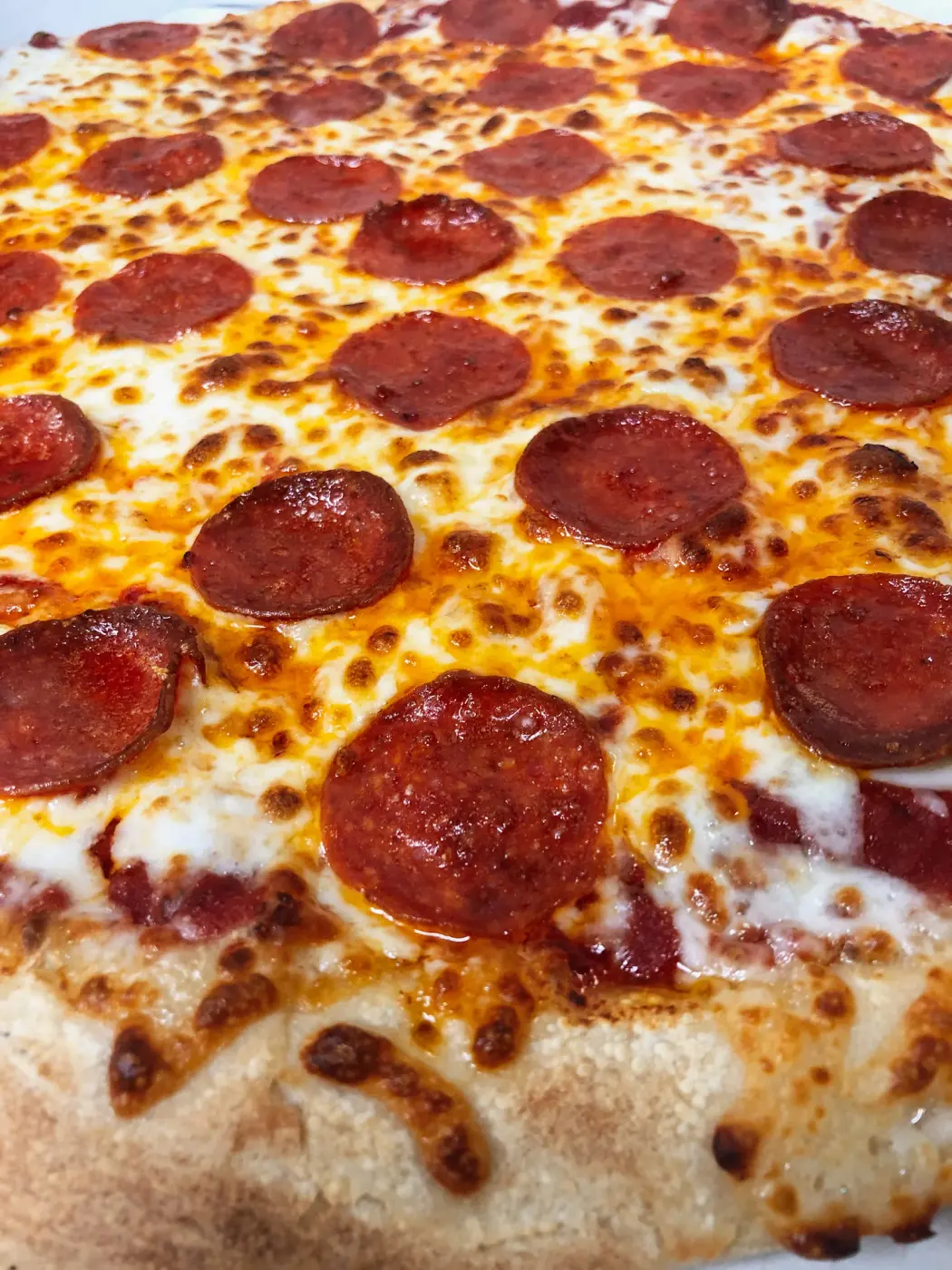 A pepperoni pizza fresh from the oven