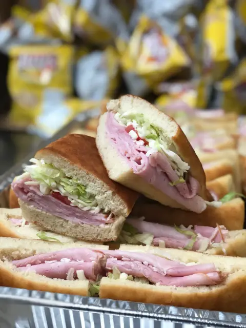 Stacked pocket sandwiches with ham and lettuce