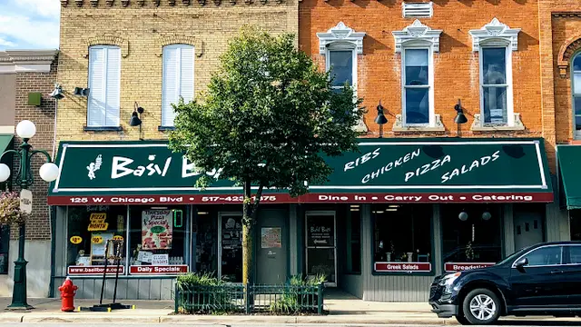 The Basil Boys storefront with green awning